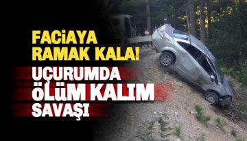 Taşatan Yolu'nda bir araç uçuruma yuvarlandı